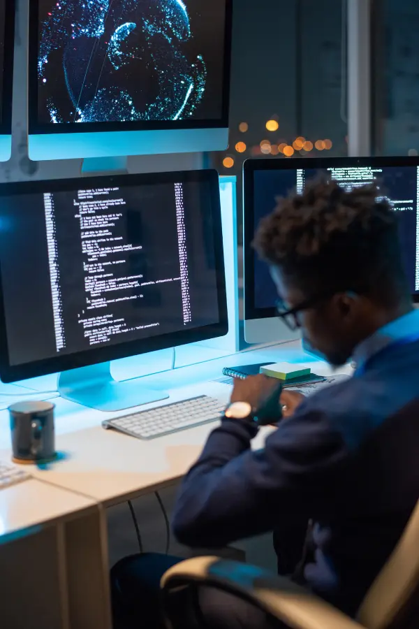 busy-young-programmer-looking-at-wristwatch-while-2025-03-13-23-53-00-utc-1.webp